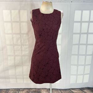 Diane Von Furstenberg sleeveless burgundy lace mini dress with pockets. Size 2
